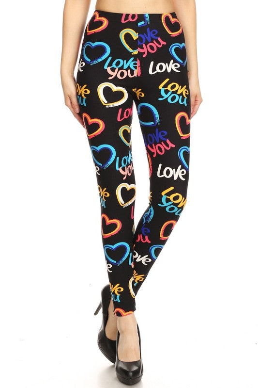 Heart graphic print, full length, high waisted leggings in a fitted style with an elastic waistband. and cuffed hems.